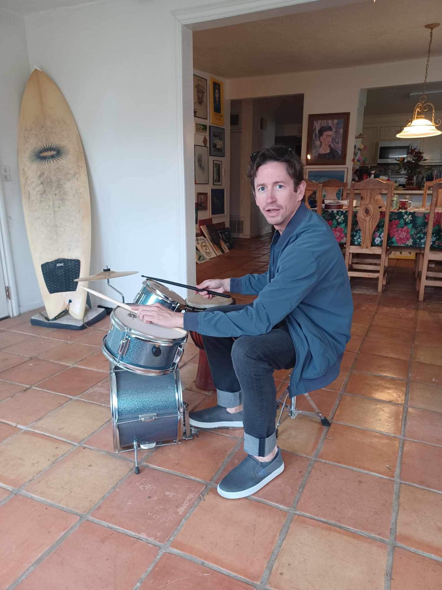 image of james on a tiny ass drum set